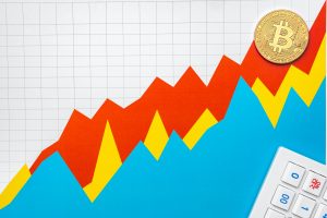 Bitcoin coin on stock market charts papers